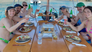 Good food, great company: Enjoying a relaxing meal together on the water