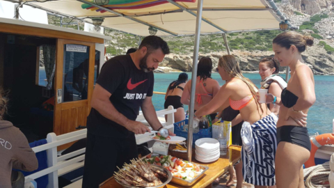 Gathered around good food and taste a Greek feast