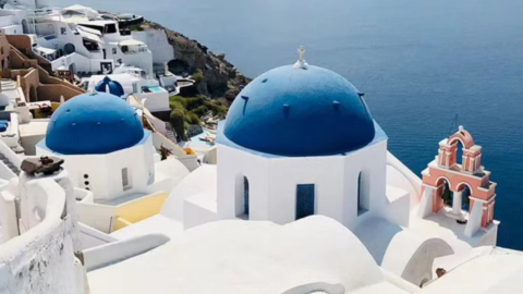 Frame your perfect shot with blue domes and endless sea