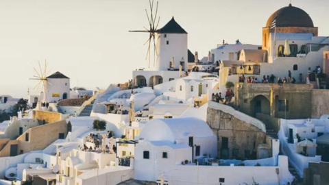 Capture the magic of whitewashed alleyways under the Aegean sun