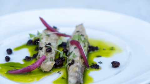 Indulge in rich flavors while the sun warms the terrace