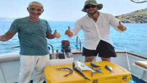 Experience the thrill of catching fish and preparing a fresh meal on board