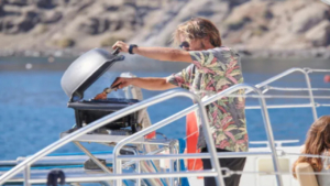 Enjoy a freshly prepared meal onboard with the sea stretching all around