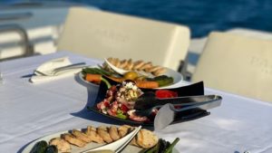 Sail Santorini on a luxury motor yacht