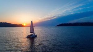 Main photo for Santorini Luxury Sunset Cruise with Swim Stops, BBQ Meal and Open Bar