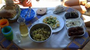 On the boat, small meals consisting of Greek products are offered to you