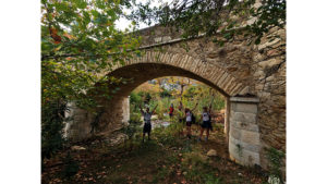 Hike into a hidden oasis of lush ravines, streams, abandoned water mills, and old settlements