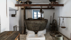 Explore centuries-old techniques in an authentic olive press