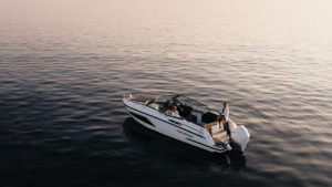 Warm breeze and fiery colors dancing over the sea at dusk