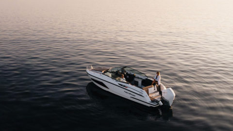 Warm breeze and fiery colors dancing over the sea at dusk