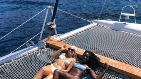 Relax on deck with a glass of wine in hand