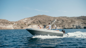 Admire the raw beauty of Santorini as the sea and cliffs unfold around you in a truly unique setting