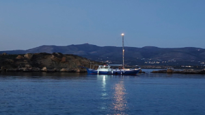 Sunset Cruise from Aliki of Paros on a Traditional Wooden Boat with Snacks & Drinks photo