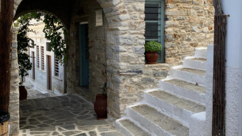Wander through the charming narrow alleys of the traditional village of Apiranthos