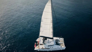 Shared Catamaran Day Cruise in Santorini. Morning or Sunset Sailing Adventure photo