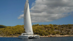 Feel the wind as the catamaran cuts through open waters