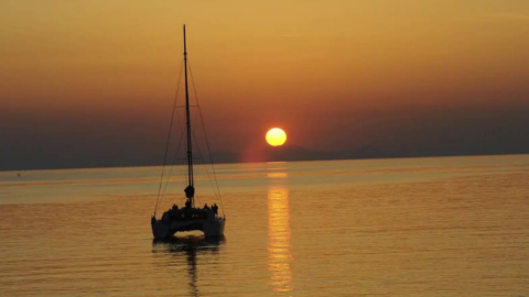 Discover the timeless charm of Santorini from the sea