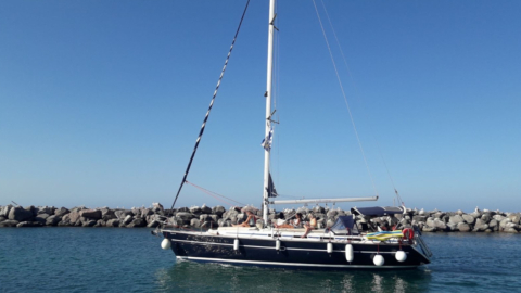 Relax on deck as the breeze carries you across the Cyclades