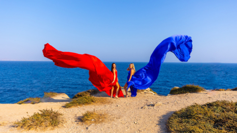 Own the moment as your dress dances with the Cycladic wind