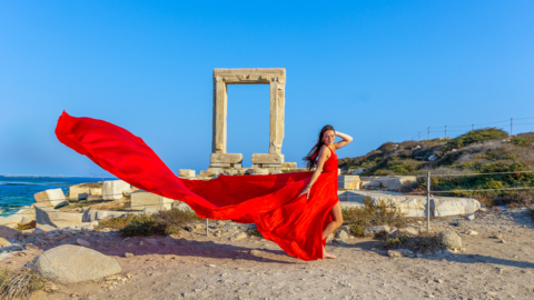 Twirl with the Aegean breeze against the backdrop of Portara