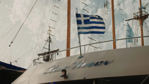 The stern of the motor yacht with the flag