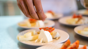 The final touch before serving the cheeses