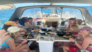 Enjoy a delicious lunch on deck while taking in the Aegean views
