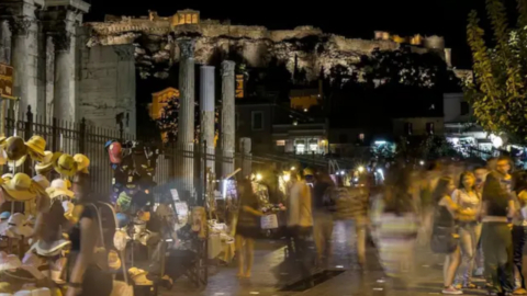 Explore Athens by night on foot and taste delicacies