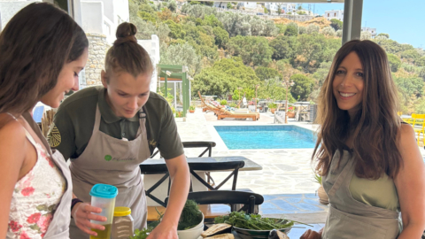 A mother is cooking with her daughter