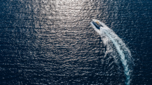 Feel the gentle sea breeze as you sail along the rugged coastline