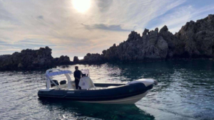 Explore sea caves and secret coastal corners by boat