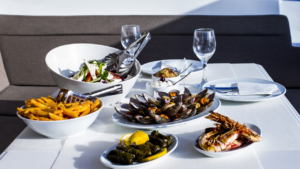 Share laughter over a beautifully prepared onboard meal