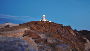 Stand at the edge of the island where light meets sea
