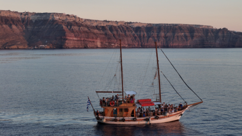 Feel the breeze on deck while cruising along the coast