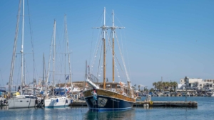 The traditional wooden cruise boat at Naxos port before departure to Koufonisia and Rina Cave